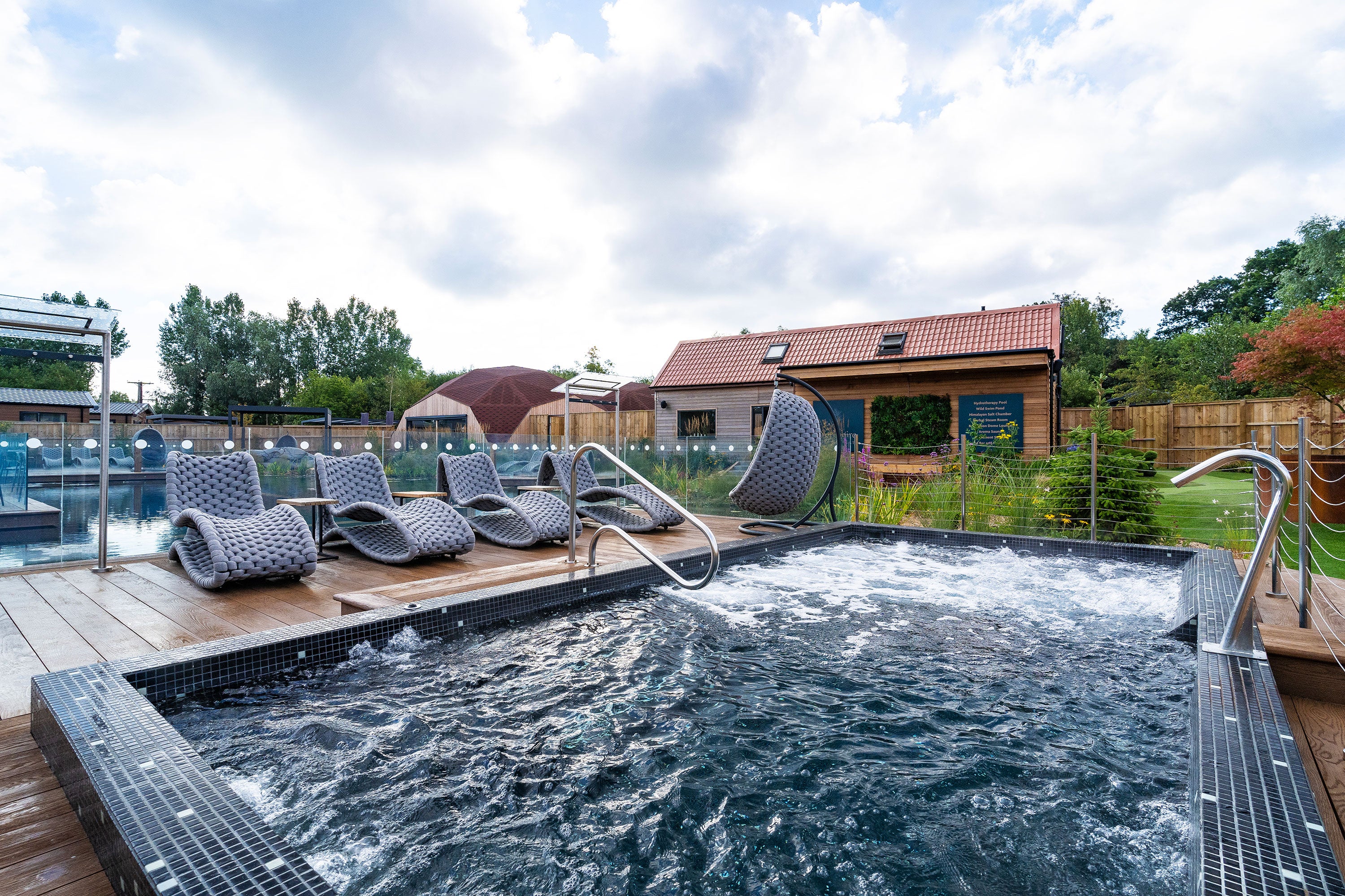 Cordial Luxe Alexander Rose Commercial chairs by the pool at Yorkshire Spa